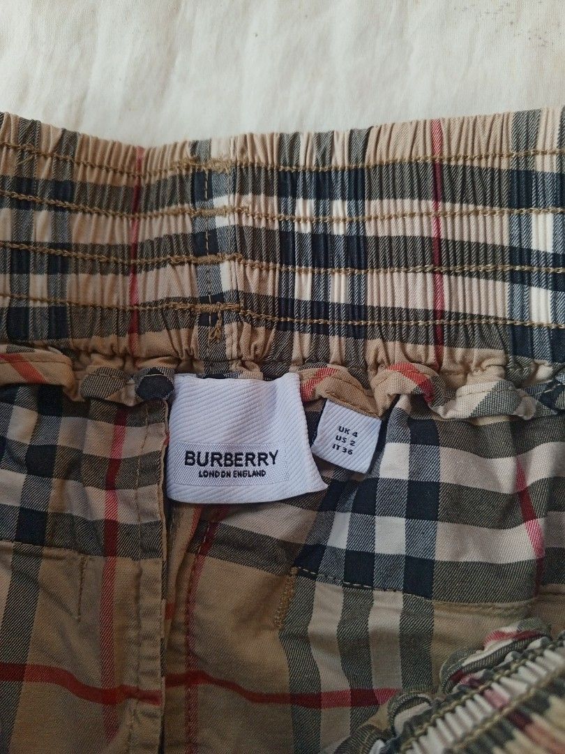 Burberry Side stripe check cotton shorts (Category: Luxury Apparel) located in Santa Maria. Submitted by paulo-garcia21 (Listing ID 1464972225, Image 3). Description: size 36 italy 24 to 32 length 14 hem 12.5 no flaws excellent condition.