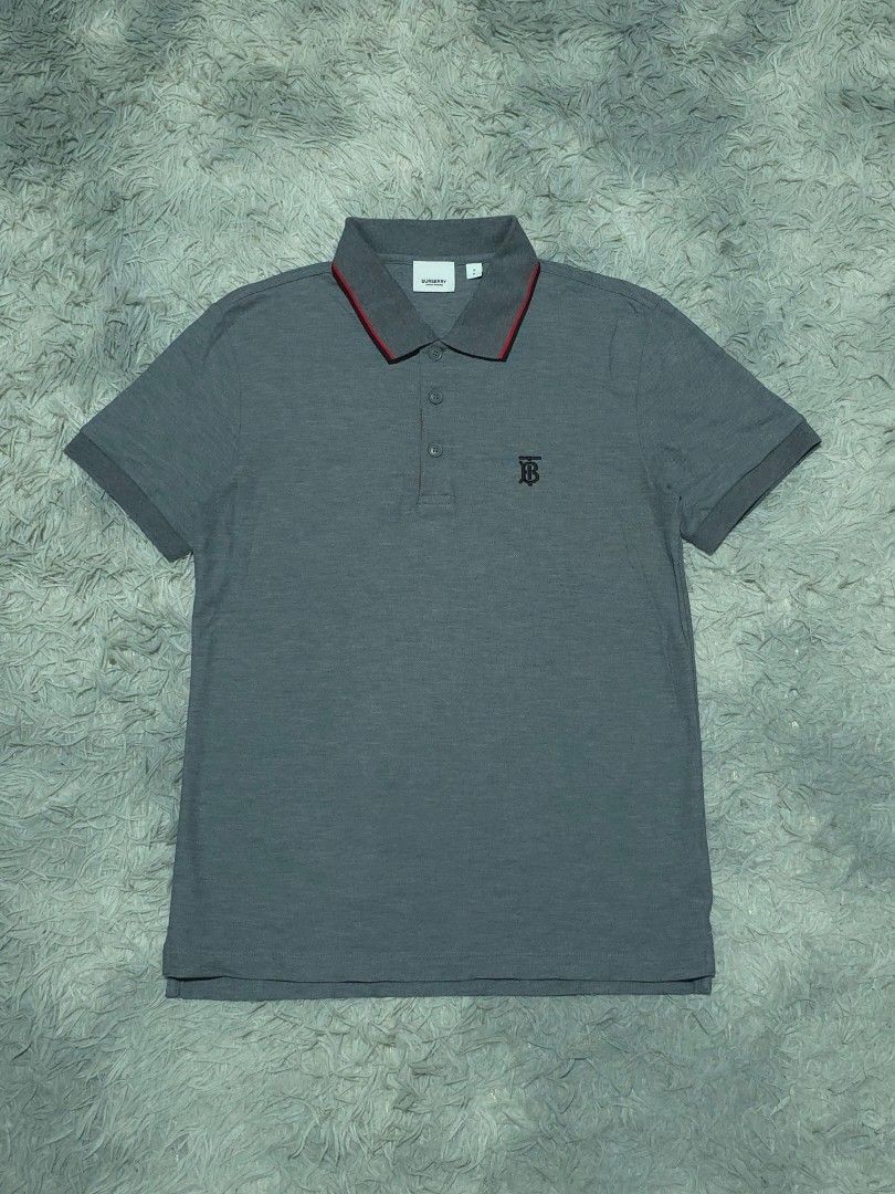 Burberry TB Poloshirt (Category: Tshirts & Polo Shirts ) located in Abulug. Submitted by humanwhosellthings (Listing ID 1464969868, Image 1). Description: BURBERRY ✅️Size: Small - Medium ✅️Dimes: 18W x 26L ✅Condition: Excellent-New ✅Issue: None ✅Color Rate: 9.8/10.
