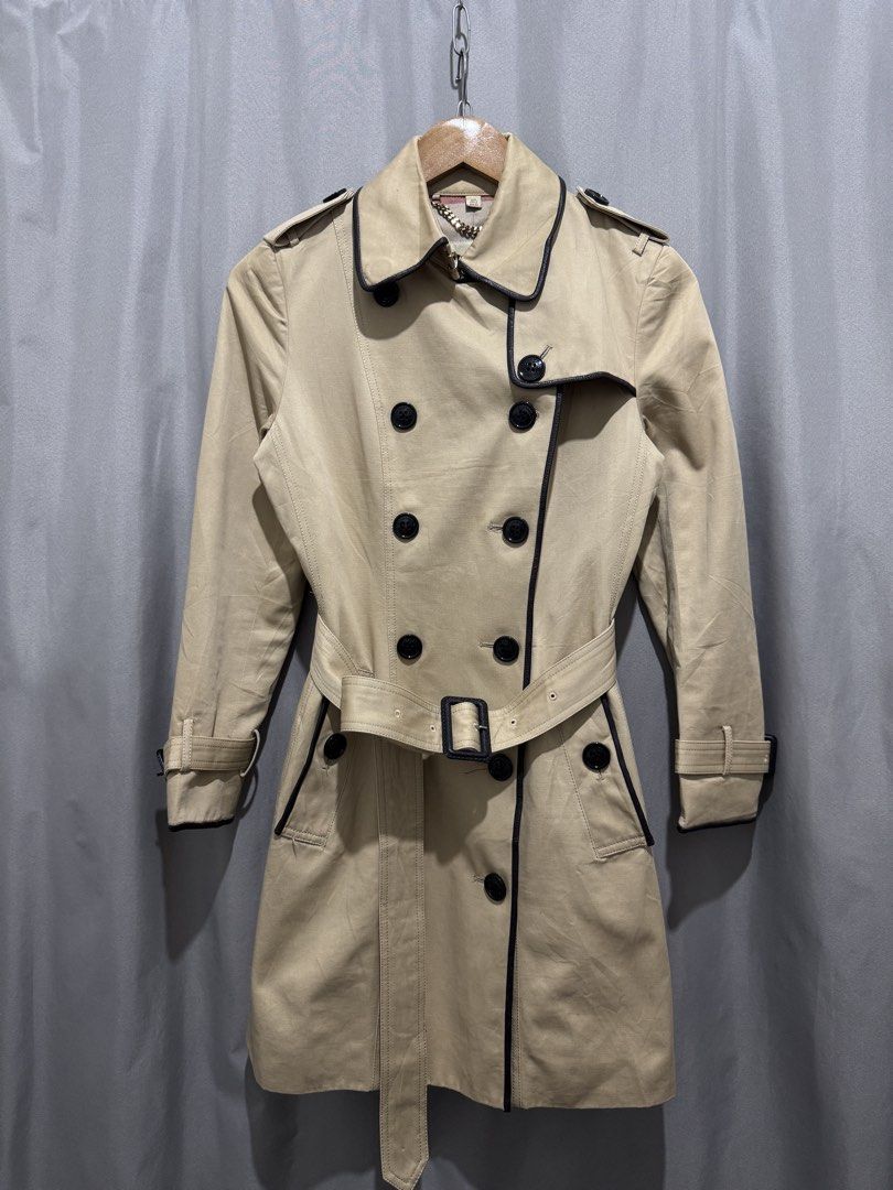 Burberry Trench Coat (Category: Coats, Jackets and Outerwear) located in Meycauayan. Submitted by itstimothrifts (Listing ID 1465020828, Image 1). Description: Burberry Trench Coat Excellent Condition Needs clean Size 6 UK Small Width 17.5 Waist 14.5 Shoulder 15 Sleeve 22.5 Length 34.