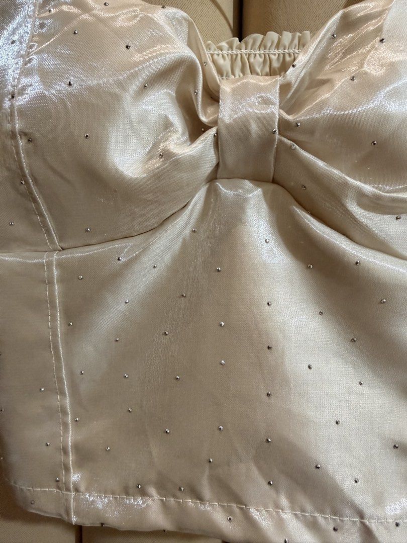Bustier Croptop (Category: Sleeveless) located in Manila. Submitted by glamstylemnl (Listing ID 1465145167, Image 3). Description: ♡ SIZE: XS ♡ BUST: 28 ♡ Swipe left to see the actual color & details ♡ padded / satin-finish / front bow detail / rhinestones / ruched back ♡ HQ • 10/10 ♡ Ready to wear 👚.