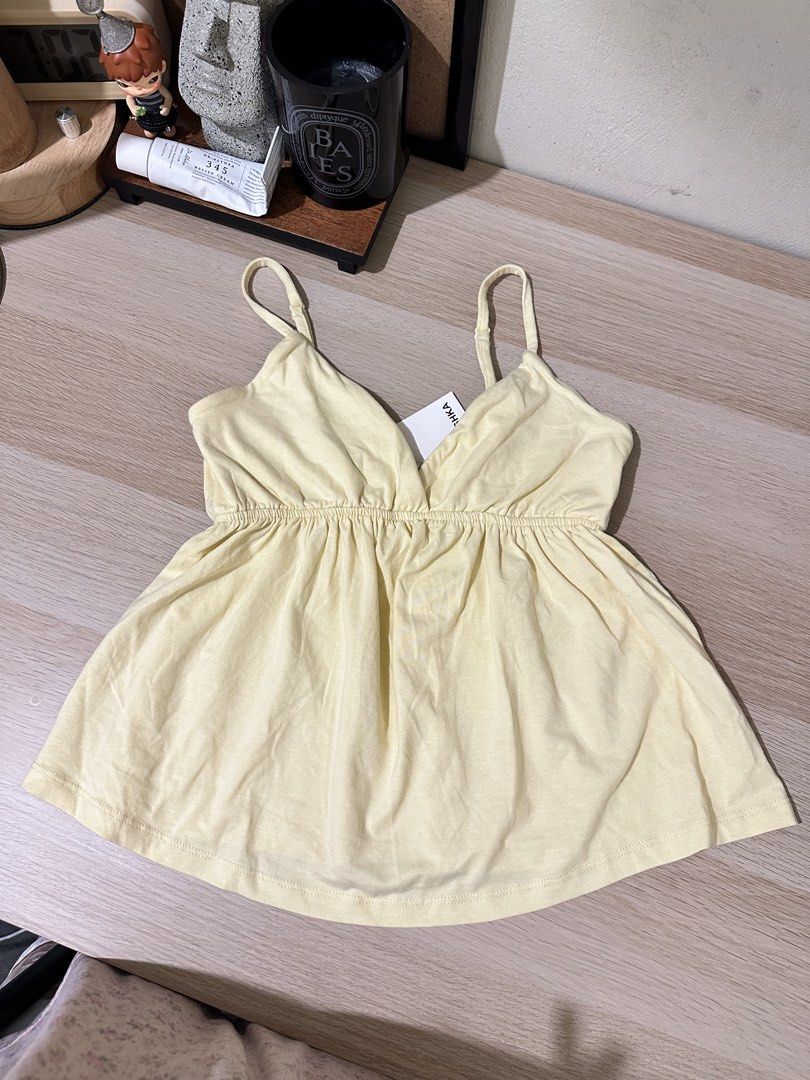 Butter yellow peplum top (Category: Sleeveless) located in Dasmarinas. Submitted by lovedbyryl (Listing ID 1465072758, Image 2). Description: personal favorite top. i have it in every color hahaha Available in XL.