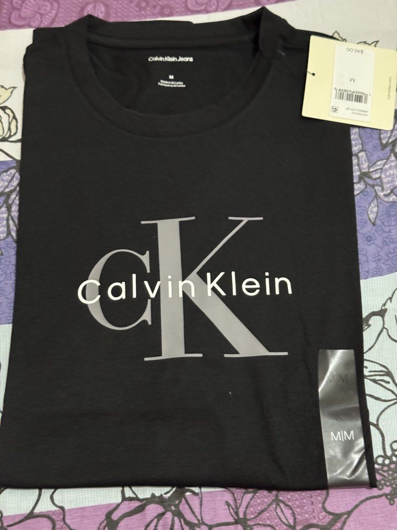 Calvin Klein Men Shirt (Category: Announcements) located in Quezon City. Submitted by branded_jo (Listing ID 1465075434, Image 2). Description: Original Calvin Klein Men Classic Shirt Med size Color black Brand new with tag Bought in US Lalamove ready.