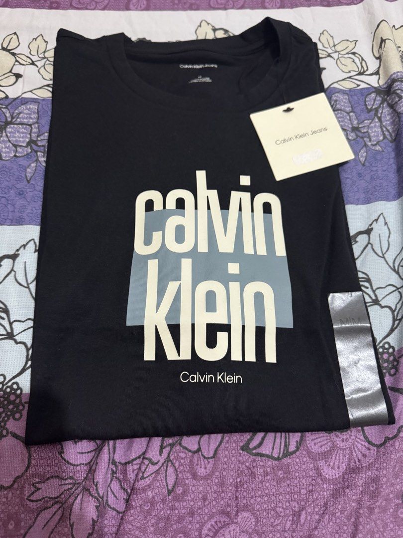 Calvin Klein Men Shirt (Category: Announcements) located in Quezon City. Submitted by branded_jo (Listing ID 1465076247, Image 3). Description: Original calvin Klein Men Shirt Classic fit Color Black Med size Brand new with tag Bought in US Lalamove ready.
