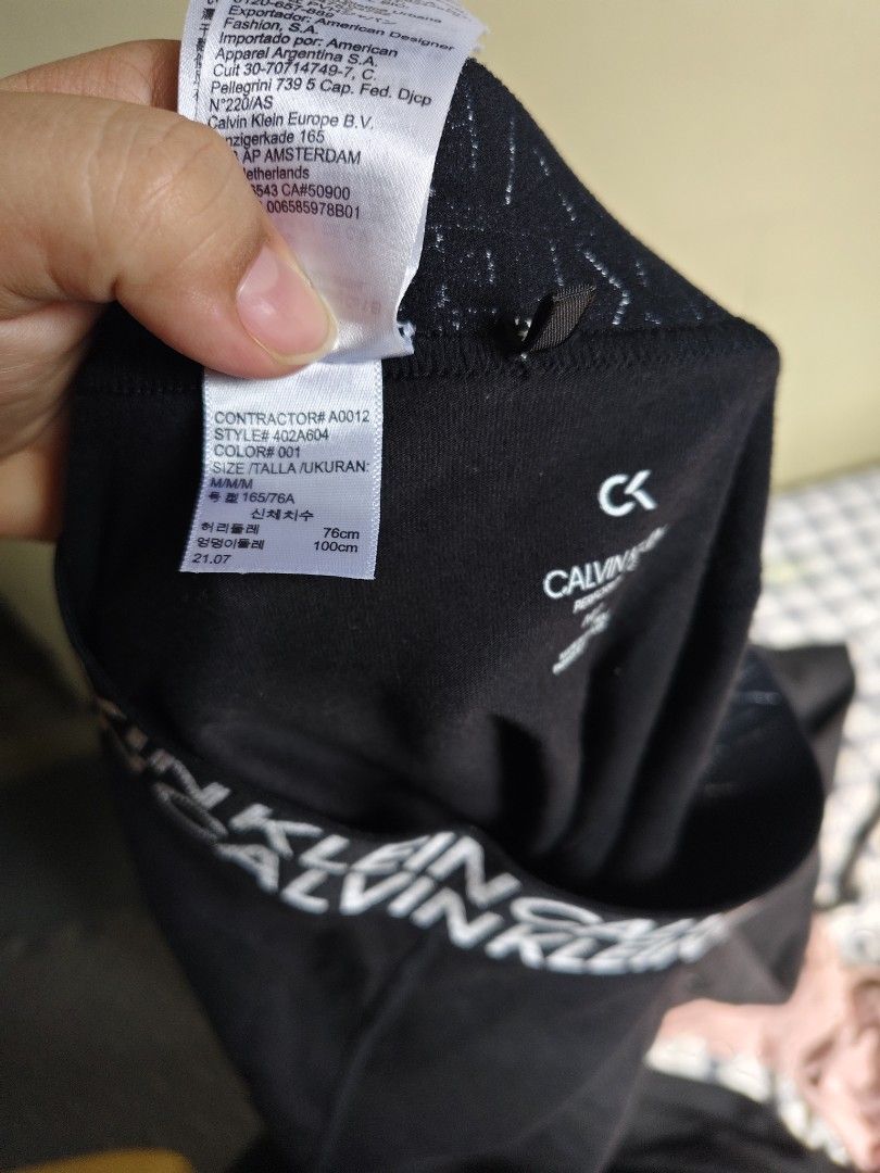 Calvin Klein Performance Black Leggings Size M (Category: Activewear) located in General Mariano Alvarez. Submitted by findsandmoreph (Listing ID 1465026046, Image 2). Description: - Brand: Calvin Klein Performance - Color: Black - Size: Medium (M) - Material: Soft and stretchable cotton-elastane blend - Features: Elastic waistband with repeating Calvin Klein logo text and small CK logo on the upper leg - Origin: Made in Sri Lanka - Condition: Br
