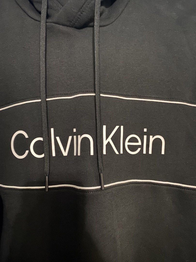CALVIN KLEIN SWEATER WITH HOODIE (Category: Activewear) located in Quezon City. Submitted by elmiras_closet (Listing ID 1465080791, Image 2). Description: original authentic apparel 9/10 condition very good condition from US Balikbayan box no flaws or issue.