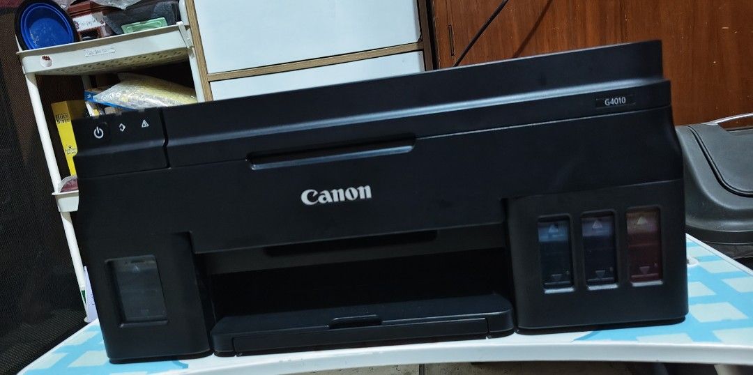Canon G4010 Ink Tank Printer (Category: Printers, Scanners & Copiers) located in Manila. Submitted by onlinestore011716 (Listing ID 1465054376, Image 1). Description: - Model: Canon G4010 All-in-One Printer (Black) - Features: Built-in front ink tanks and compact desk-friendly design - Condition : Error code B204 - Collection: Pick up only.