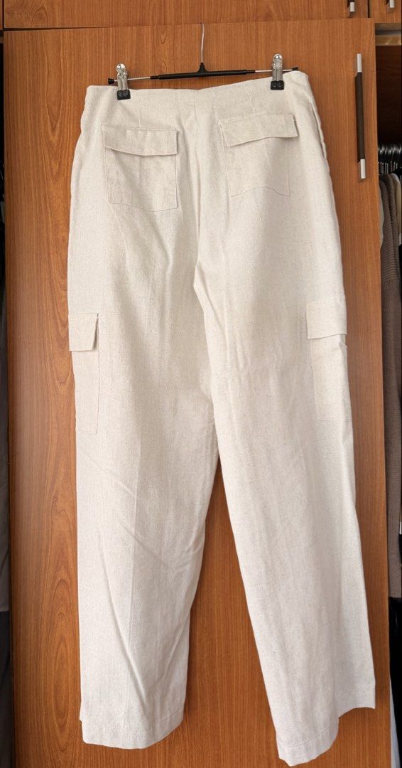 Cariño beige linen cargo pants (Category: Jeans) located in Cavite. Submitted by klarev (Listing ID 1465029189, Image 2). Description: - Medium on tag but altered to Small - Straight/wide leg fit .