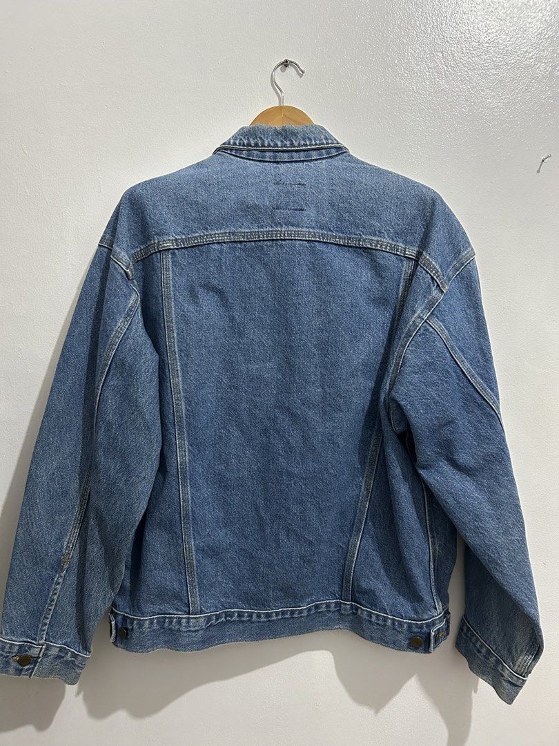 Carousell Carhartt J12DST Denim Jacket (Category: Coats, Jackets and Outerwear) located in Angeles City. Submitted by cassey_phoenix (Listing ID 1465060933, Image 3). Description: - Brand: Carhartt - Model: J12DST Denim Jacket - Color: Blue with great natural fading - Size: Large Regular - Material: 100% cotton (Made in USA) - Features: Button-up front with branded metal buttons, chest flap pockets, vertical welt pockets, and blank leather patch 