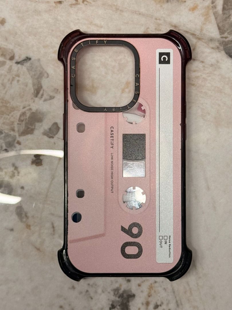 CASETiFY RETRO PINK CASSETTE BOUNCE CASE (MAGSAFE) (Category: Cases & Sleeves) located in Makati City. Submitted by fpled (Listing ID 1465144647, Image 1). Description: ✨ CASETiFY RETRO PINK CASSETTE BOUNCE CASE (MAGSAFE) ✨ • Fits iPhone 13 & iPhone 14 PRO (6.1") • Custom Japan Order 🇯🇵 • Maximum Drop Protection CASETiFY Bounce Case featuring an aesthetic vintage pink cassette tape print with dark plum/burgundy protective corner bumpers! -Custo