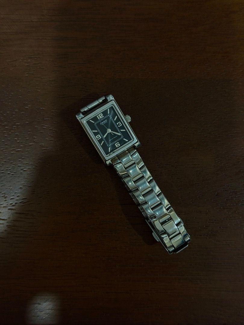 Casio || Minimalist yet Chic (UNISEX WATCH) (Category: Men's Watches) located in Manila. Submitted by luvfrombee.boi (Listing ID 1465013316, Image 1). Description: Brand: Casio Model: LTP-1237 Series Movement: Quartz (Battery operated) Case Shape: Rectangular / Tank Band: Stainless Steel Dial: Black/Dark Blue with 12-3-6-9 numerals Features: Water resistant (30m / Splash resistant) Condition : Pre-owned / Used condition with minor scratches on th