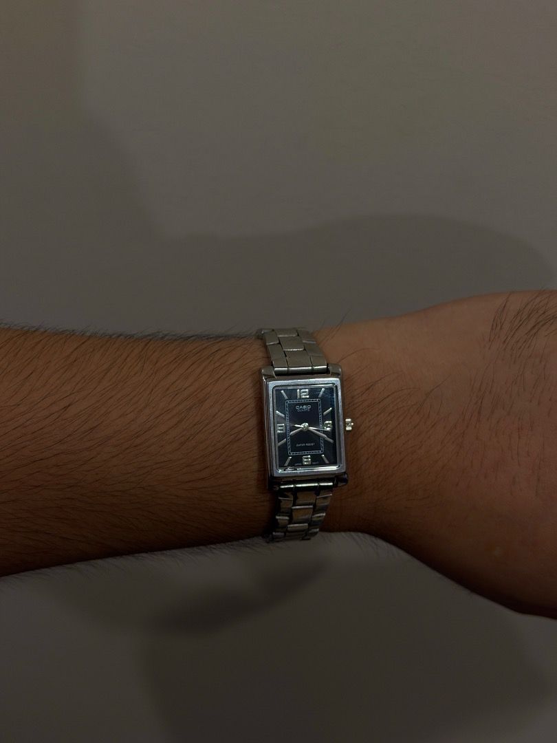 Casio || Minimalist yet Chic (UNISEX WATCH) (Category: Men's Watches) located in Manila. Submitted by luvfrombee.boi (Listing ID 1465013316, Image 2). Description: Brand: Casio Model: LTP-1237 Series Movement: Quartz (Battery operated) Case Shape: Rectangular / Tank Band: Stainless Steel Dial: Black/Dark Blue with 12-3-6-9 numerals Features: Water resistant (30m / Splash resistant) Condition : Pre-owned / Used condition with minor scratches on th