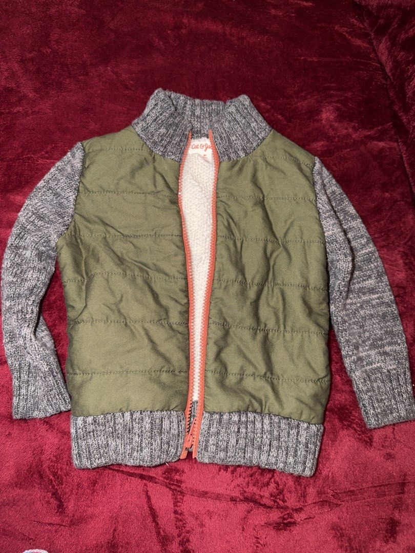 Cat & Jack Toddler Quilted Sweater Jacket Size 2T (Category: Babies & Kids Fashion) located in Manila. Submitted by karlaaricheta (Listing ID 1465081874, Image 1). Description: - Brand/Model: Cat & Jack kids zip-up jacket - Size: 2T - Design: Olive green quilted body with grey knit sleeves and collar, accented with an orange front zipper - Interior: Lined with ultra-soft white sherpa for maximum warmth - Condition/Use: Great layering piece for co