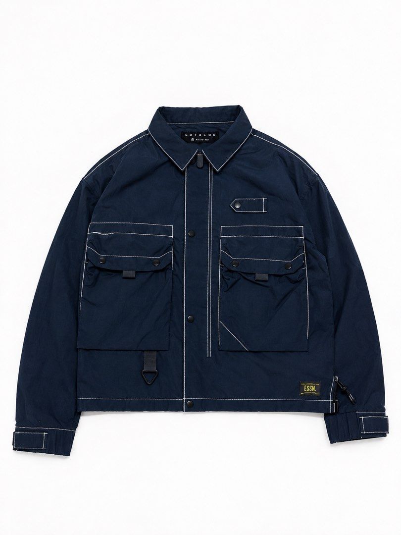 Catalog Navy Blue Cargo Utility Jacket (Category: Coats, Jackets and Outerwear) located in Palo. Submitted by kat.bins (Listing ID 1465071671, Image 1). Description: Dimes Width - 24 Length - 26.
