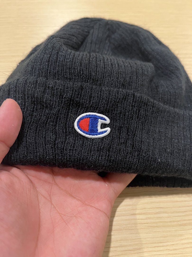 Champion Black Ribbed Beanie Hat OSFA (Category: Caps & Hats) located in Quezon City. Submitted by flip_da_cash (Listing ID 1465114616, Image 2). Description: - Brand: Champion - Color: Classic Black - Details: Iconic embroidered logo patch on front cuff - Style: Ribbed knit, one size fits all - Condition/Authenticity: Verified official piece with interior tag - Perfect for daily wear and easy to style with any winter outfit.