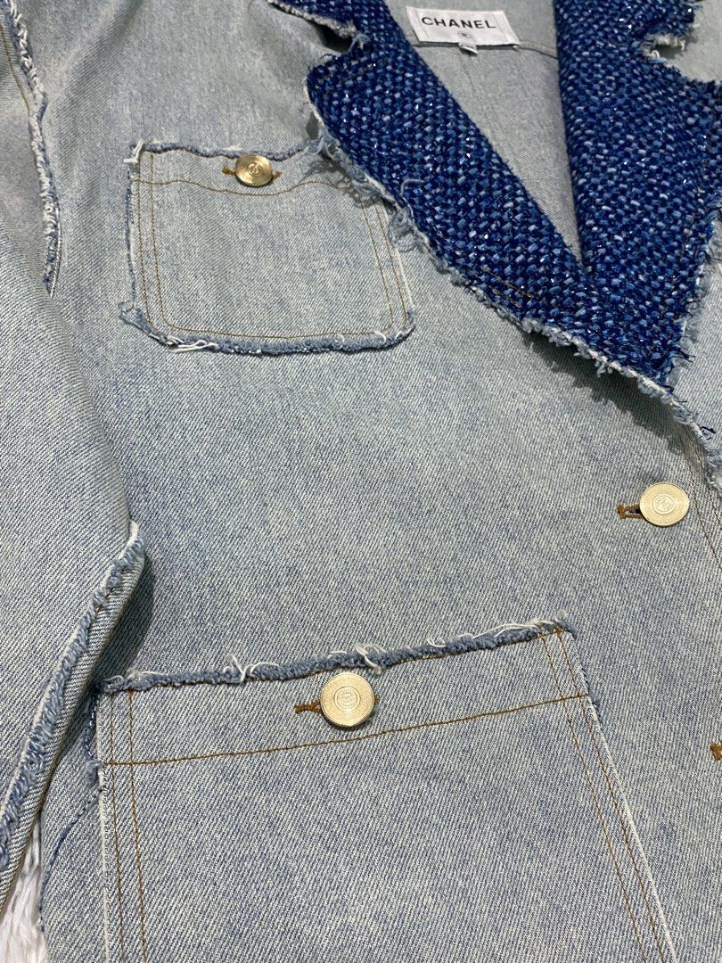 Chanel Denim Jacket Blue Tweed Lapel Size 34 (Category: Coats, Jackets and Outerwear) located in Manila. Submitted by thritingera25 (Listing ID 1464998145, Image 2). Description: - Authentic Chanel denim jacket - Size: 34 - Light wash denim with contrast blue tweed lapel and trim - Trendy raw frayed edges along seams and pockets - Signature gold-tone metal buttons with engraved CC logo - Four functional front flap pockets - Guaranteed authentic, 