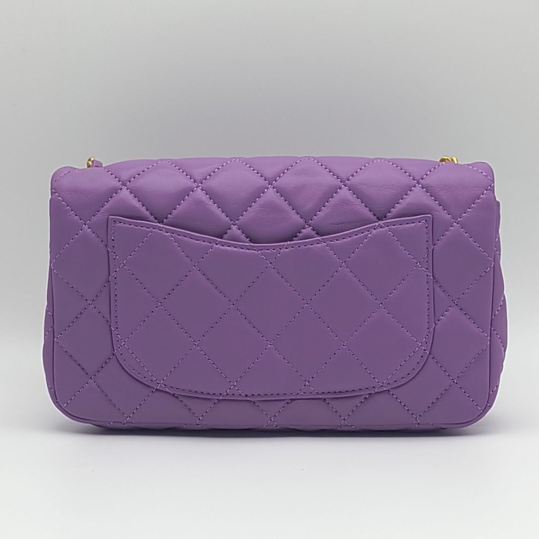 Chanel Mini Rectangular Pearl Crush Flap Bag - Purple (Category: Luxury Bags & Wallets) located in Cebu City. Submitted by affordabagss (Listing ID 1465145891, Image 3). Description: Chanel Mini Rectangular Pearl Crush Flap Bag in purple lambskin leather. Features the signature adjustable Pearl Crush chain, matte gold hardware, and classic CC turn-lock closure. Can be worn over the shoulder or crossbody. Length: 20 cm Height: 12 cm Depth: 6 cm Co
