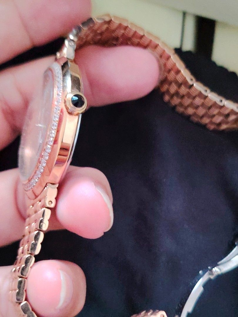 Chanel Rose Gold Diamond Bezel Watch (Category: Women's Watches) located in Paranaque City. Submitted by lucille1280 (Listing ID 1464994810, Image 2). Description: - Authentic Chanel rose gold watch - Round silver sunburst dial with crystal-accented floral motif - Bezel entirely set with sparkling small -replica crystals - Matching rose gold link bracelet with secure deployment clasp - Crown features a chic dark cabochon stone inset - Case back e
