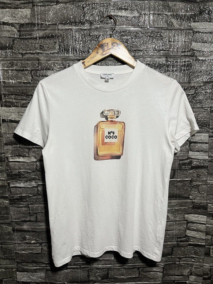 Chanel Shirt (Category: Luxury Apparel) located in Manila. Submitted by flex_curation (Listing ID 1465132452, Image 1). Description: 18x24 IN VERY GOOD CONDITION BACOOR CAVITE LOC.