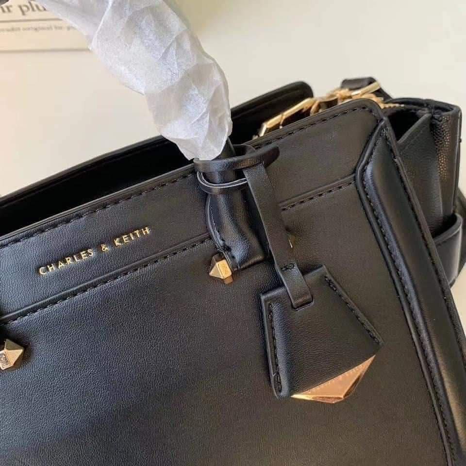 Charles & Keith Structured Trapeze Bag (Category: Cross-body Bags) located in Manila. Submitted by chic.collectivemnl (Listing ID 1464989298, Image 3). Description: .