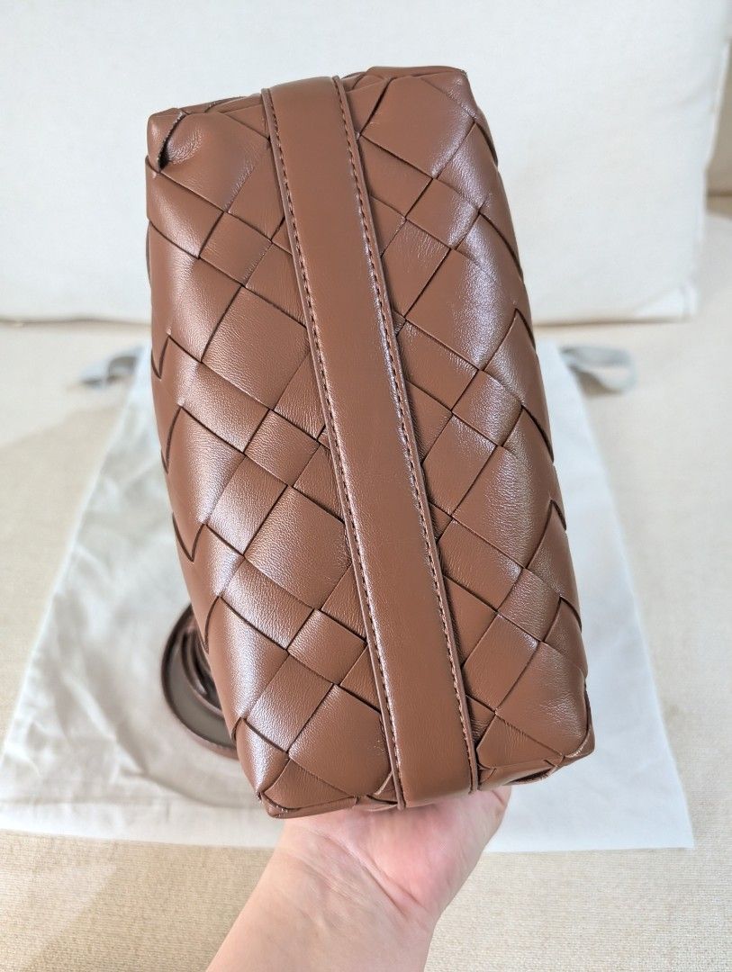 Charles & Keith Woven Brown Shoulder Bag (Category: Shoulder Bags) located in Manila. Submitted by cart_rd (Listing ID 1465029758, Image 2). Description: - Brand: Charles & Keith - Color: Brown woven design - Features: Secure top zip closure and spacious main compartment - Pockets: Interior zip pocket for small essentials - Straps: Includes a detachable long strap for shoulder or crossbody use - Inclusion: Comes with original dust bag, tags are s