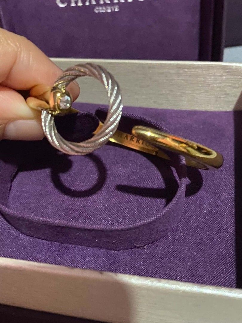 Charriol Infinity Zen Bracelet (Category: Bracelets) located in Manila. Submitted by goodbuying_items0211 (Listing ID 1465170555, Image 3). Description: Charriol Infinity Zen bangle bracelet in gold and silver tone steel cable design. Features a circular charm element with a stone detail. Reference number 04-104-1232-05. Original box, paper bag, and international warranty card dated May 31, 2026 included. 💯 Original.