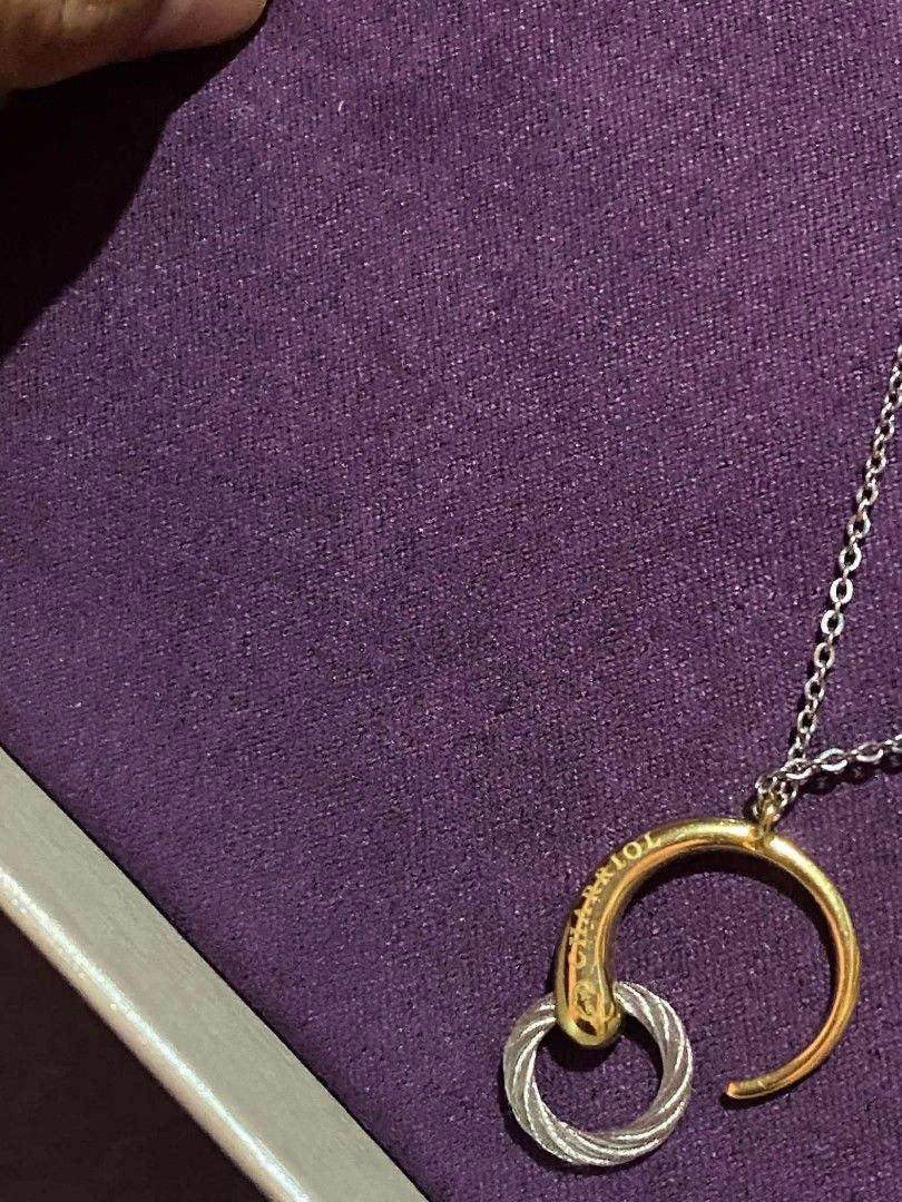 Charriol Infinity Zen Necklace (Category: Necklaces) located in Manila. Submitted by goodbuying_items0211 (Listing ID 1465170242, Image 3). Description: - Brand: Charriol Authentic - Style: Infinity Zen necklace (gold and silver tones) - Design: Interlocking cable pendant with engraved branding - Condition: Brand new, never worn, carefully stored in box - Inclusions: Original chain, guarantee card (dated 5/31/26), and purple presentation box - Pe