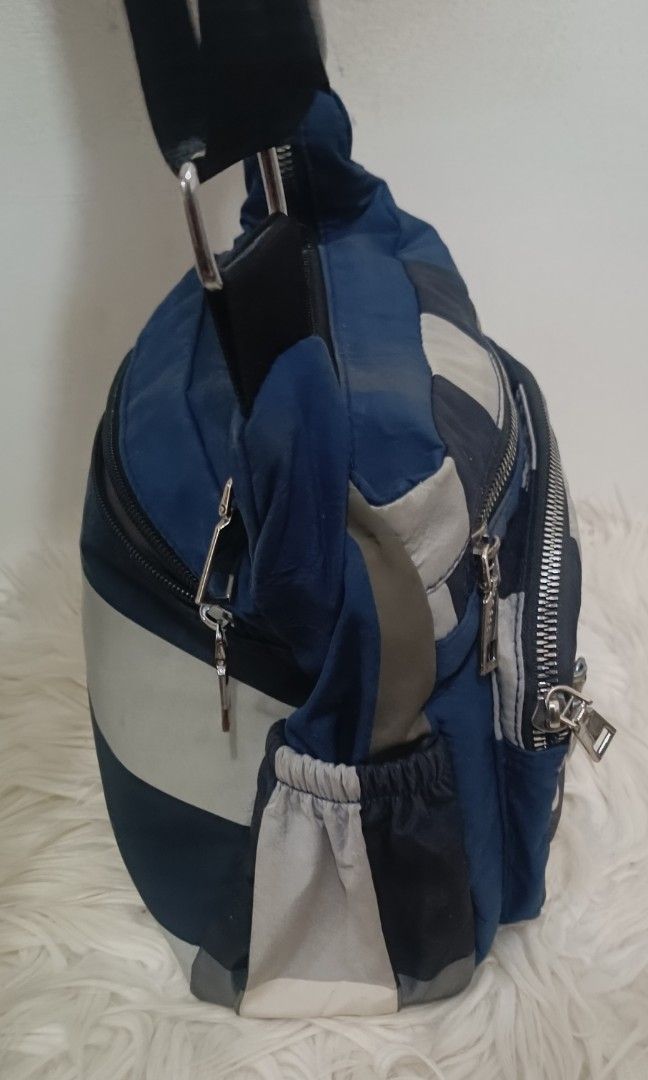 Checkered Multi Pocket Sling Bag (Category: Cross-body Bags) located in Davao. Submitted by naxarugal (Listing ID 1464969991, Image 2). Description: ukay source no issue need lng ng laba size height 7.7 inches length 10 inches width 4.7 inches.