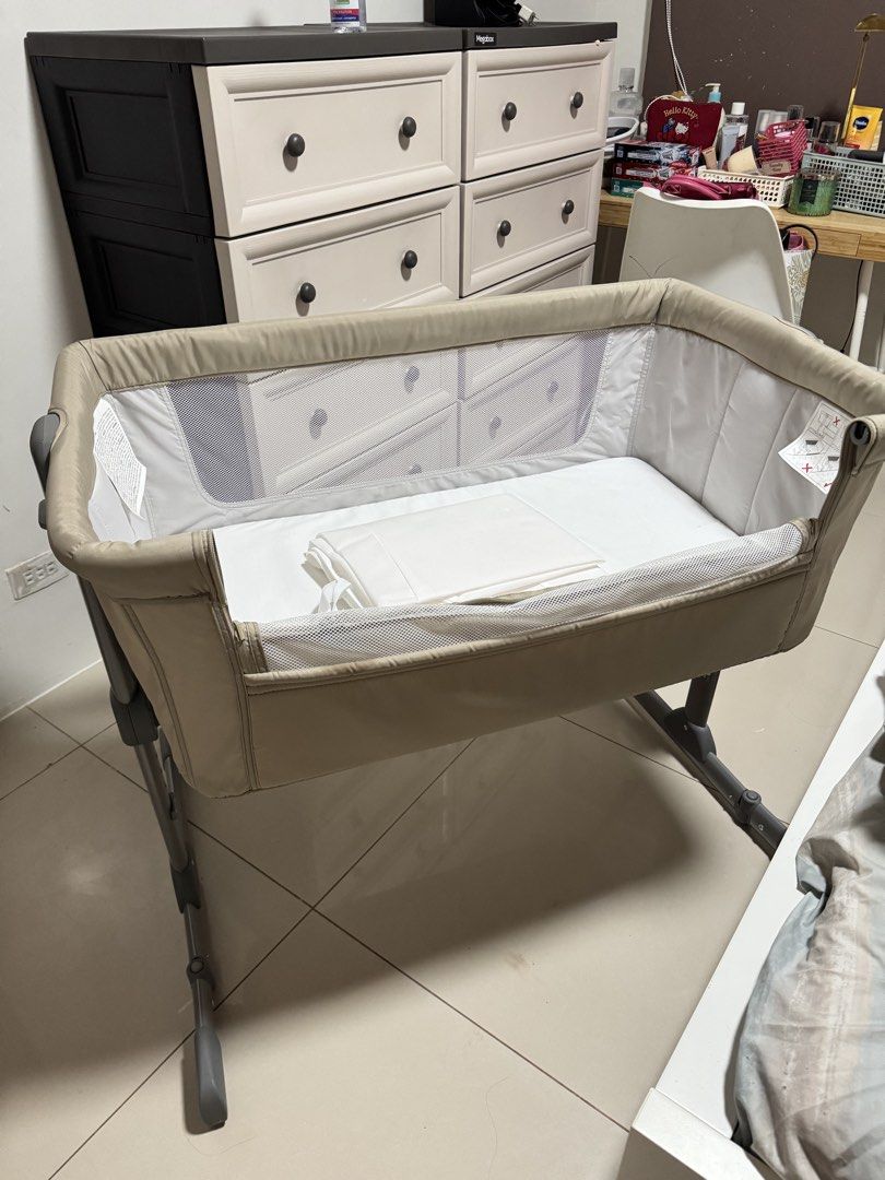 Chicco Next to me crib (Category: Cots & Cribs) located in Manila. Submitted by warmmoon-0a97 (Listing ID 1465130278, Image 3). Description: Not really used Naka setup lang sya sa room for 3months Ayaw ni baby separate bed Good as new. Can check first before ipay. Check photo for original price reference. No more box but I still have its own bag. Has its own mattress Tondo area. Can pickup here sa house Can Cod via lalamove/grab.