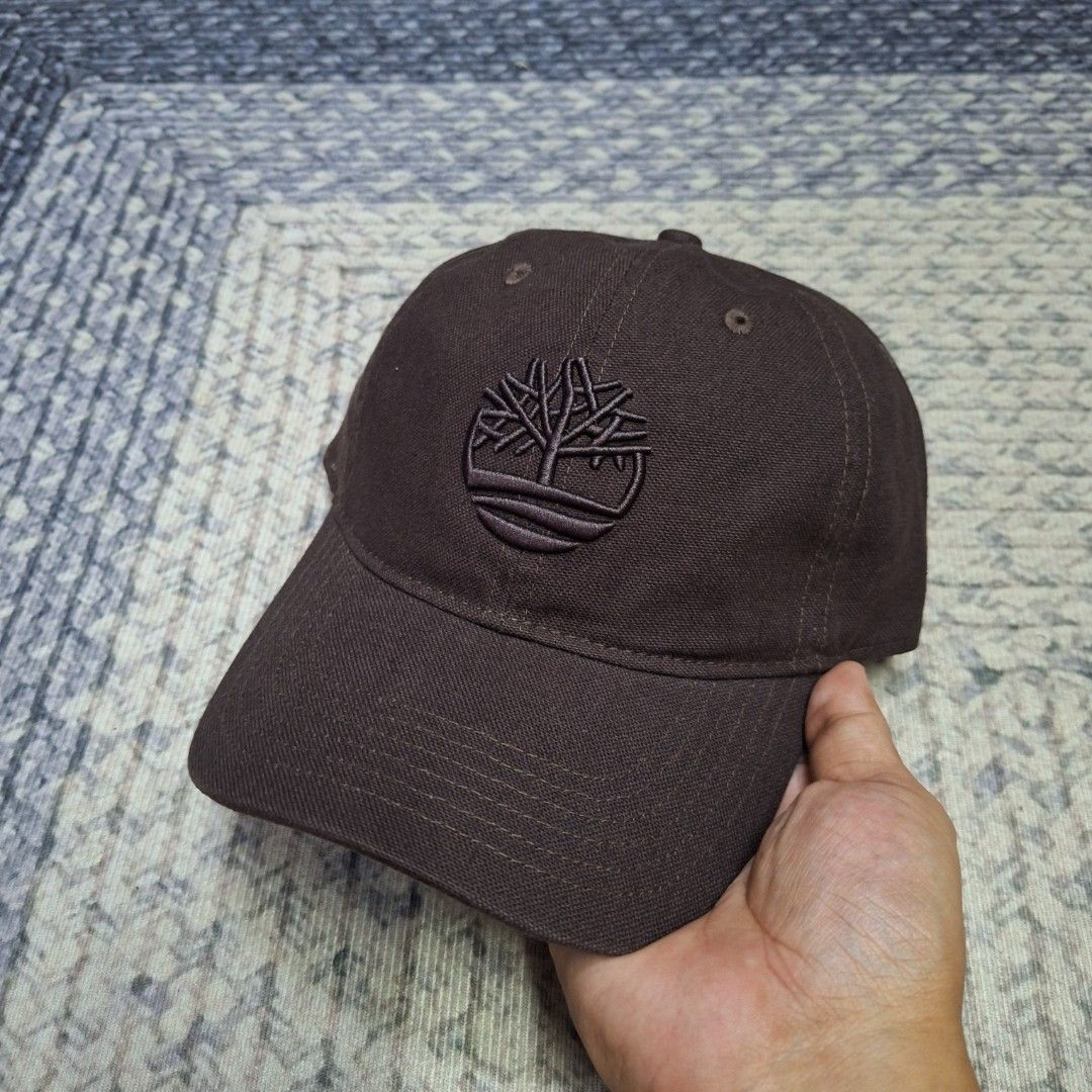 Chocobrown big logo unstructured bucklestrap dad cap/hat by Timberland (Category: Caps & Hats) located in Balagtas. Submitted by capncaps09 (Listing ID 1464999517, Image 1). Description: Chocobrown big logo unstructured bucklestrap dad cap/hat by Timberland organic cotton brand new legit 100% 550.