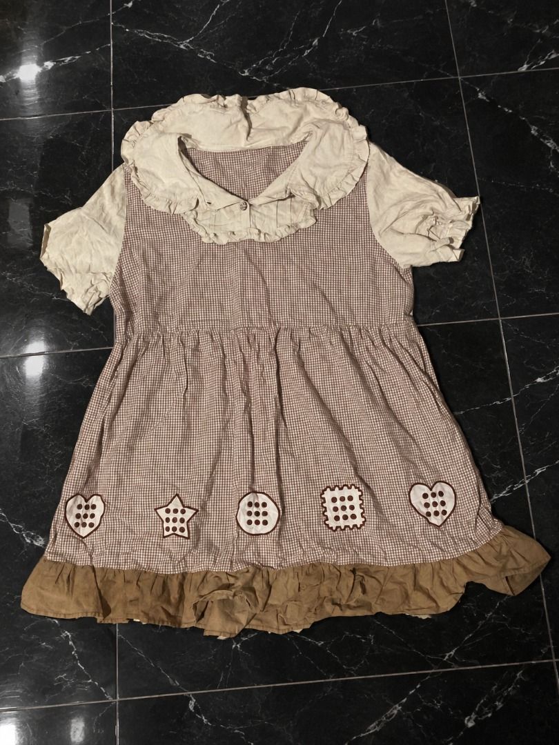 Chocolate Biscuit Gingham Dress (Category: Dresses) located in Manila. Submitted by sakki.ph (Listing ID 1465130647, Image 1). Description: Size S–M | Above the knee on 5'2" Cute chocolate brown gingham dress with cream ruffle collar and adorable biscuit/button-inspired appliqués 🤎🍪 Super sweet and vintage-looking, chocolate biscuit / cookie-inspired color palette! • S–M • Above the knee on 5'2" • Brown & cream gingham • Big ruffled collar • Pu