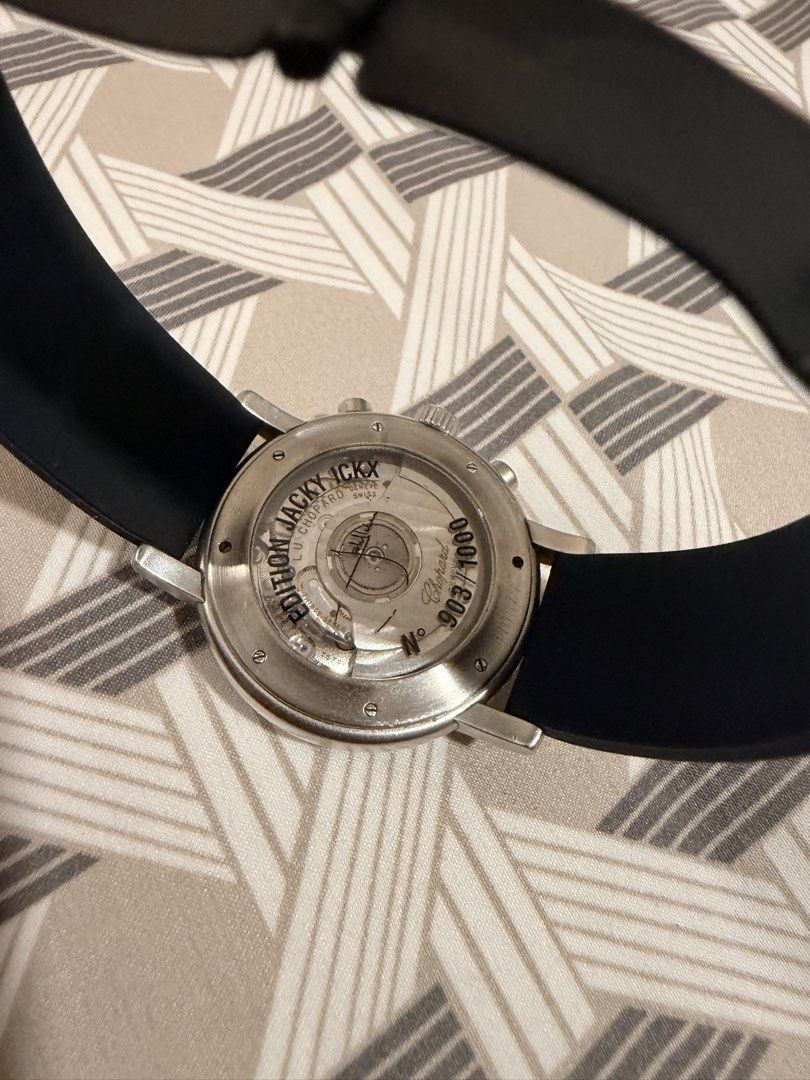 Chopard Jacky Ickx Edition Automatic Watch (Category: Men's Watches) located in Manila. Submitted by jack81472 (Listing ID 1465080882, Image 2). Description: - Brand: Chopard Automatic Chronograph - Dial: Silver with black sub-dials, Arabic numerals, and outer tachymeter scale - Case: Stainless steel round case with exhibition back - Limited Edition: Engraved 'Edition Jacky Ickx' and numbered 903 out of 1000 - Strap: Comfortable black rubber stra