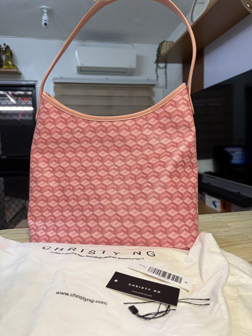 Christy Ng Alesso Pink Large (Category: Shoulder Bags) located in Cavite. Submitted by eligaya1417 (Listing ID 1465120967, Image 1). Description: Almost new used for few times lang Very nice pa Rfs: malaki masiyado With dustbag and tags Lalamove/lbc Sf shouldered by the buyer Payment first.