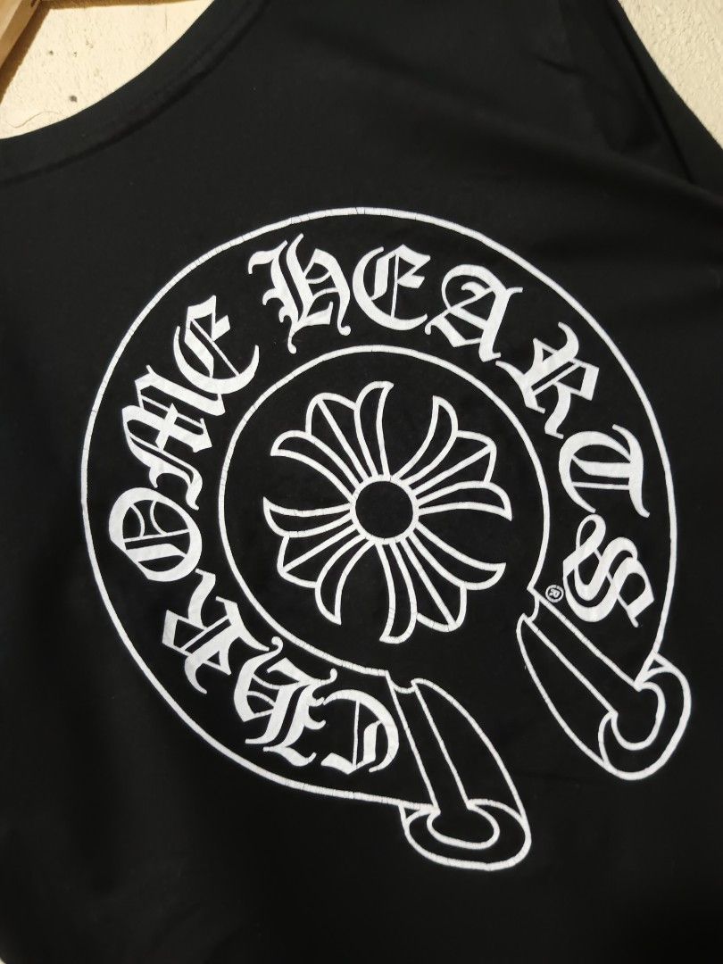 Chrome hearts (Category: Activewear) located in San Pablo. Submitted by thriftyjd (Listing ID 1465069562, Image 2). Description: Dimes: L28 x W21 Condition/color rate: 9/10 Issue: some parts of print has minimal lines.