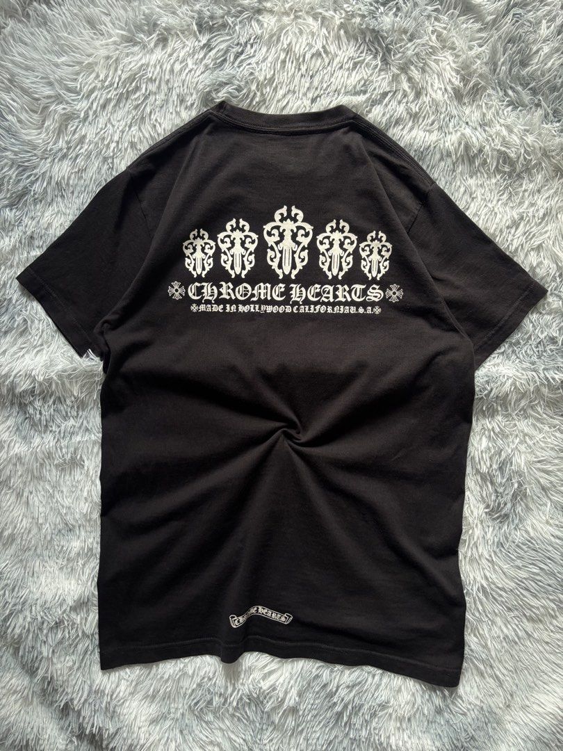Chrome Hearts Black Dagger Pocket Tee (Category: Tshirts & Polo Shirts ) located in San Jose del Monte. Submitted by j.thrifttt (Listing ID 1465026871, Image 2). Description: CHROME HEARTS DAGGER TEE - Excellent condition - Dimension: 19.5 x 28 - Color rate: 10 / 10 - Issue: None.