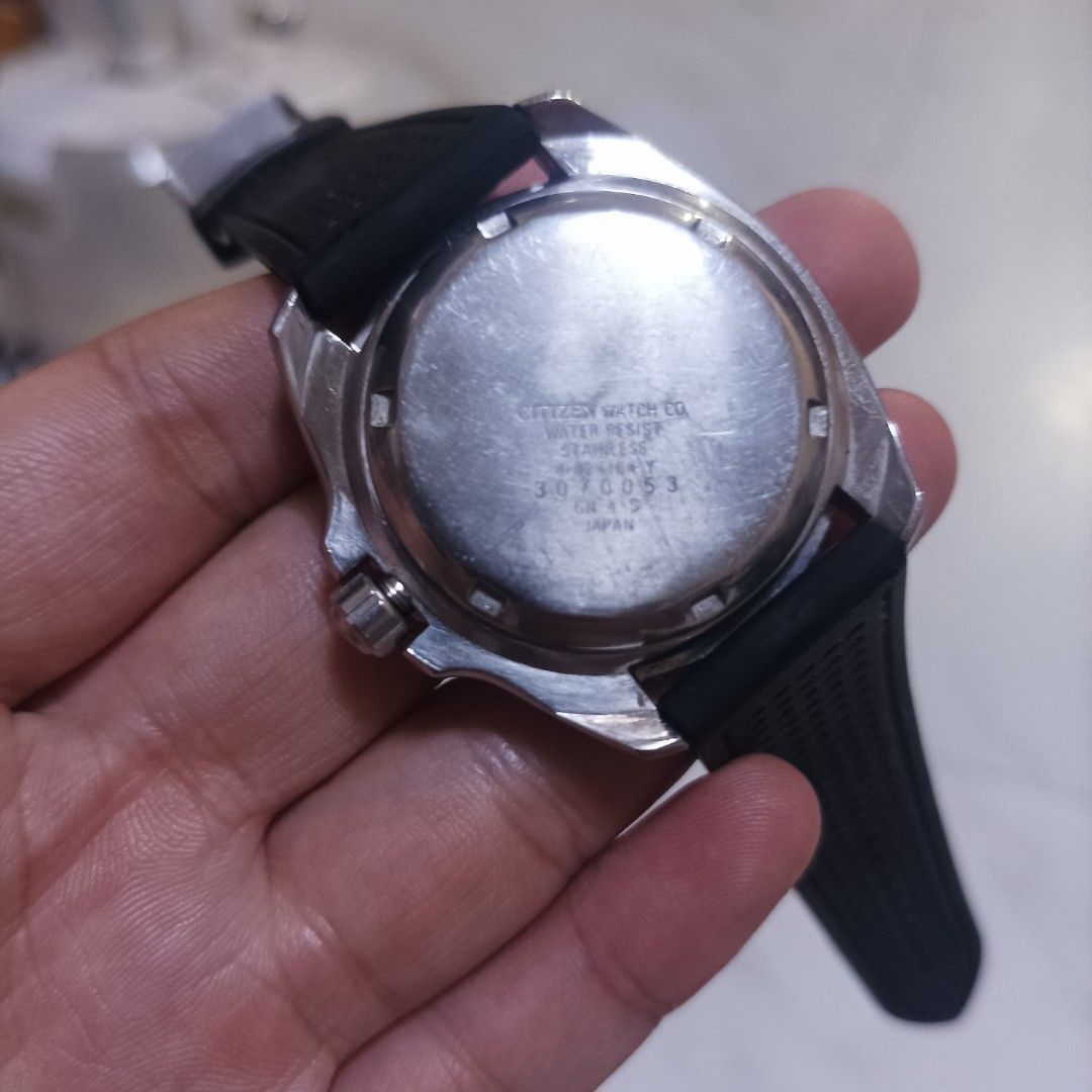 Citizen Automatic Pepsi ny2300 (Category: Men's Watches) located in Caloocan City. Submitted by guraygenes (Listing ID 1464984957, Image 2). Description: - Brand: Citizen automatic diver watch - Bezel & Dial: Classic Pepsi bezel with black day-date dial at 3 o'clock - Strap: Fitted with a black vented rubber strap - Extras: Includes an extra two-tone steel and gold bracelet in a separate bag - Movement: Reliable automatic movement powered by wris