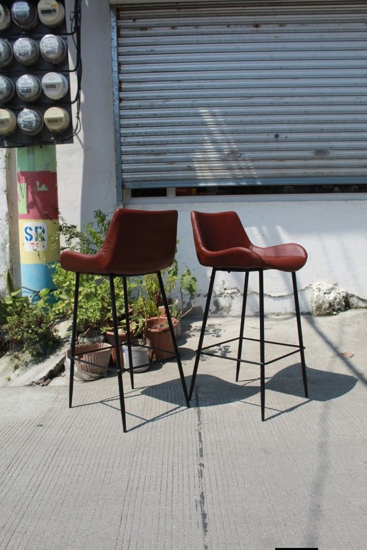 Ciunter/Bar Chair (Category: Chairs) located in Meycauayan. Submitted by marygracecasimiro (Listing ID 1465170152, Image 3). Description: Counter / Bar Chairs Set of 2 Risley S counter chairs with rich reddish-brown leather seats, black powder-coated steel frames and built-in footrests. Modern and versatile, perfect for kitchen counters, cafes, bars or office lounges L:18 ½ • W:17 • Seat H:28 • Back H:37 ¾ inches Set for only 9,900 pesos💚.