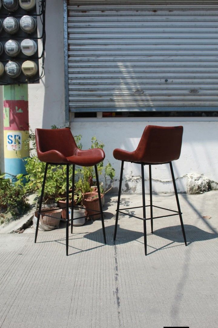 Ciunter/Bar Chair (Category: Chairs) located in Meycauayan. Submitted by marygracecasimiro (Listing ID 1465170152, Image 2). Description: Counter / Bar Chairs Set of 2 Risley S counter chairs with rich reddish-brown leather seats, black powder-coated steel frames and built-in footrests. Modern and versatile, perfect for kitchen counters, cafes, bars or office lounges L:18 ½ • W:17 • Seat H:28 • Back H:37 ¾ inches Set for only 9,900 pesos💚.