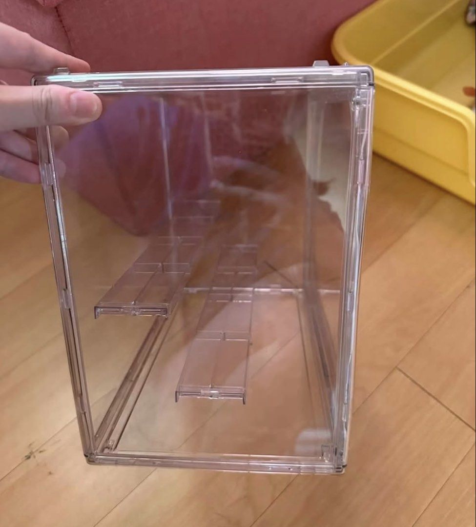 Clear Acrylic Display Case (Category: Storage Boxes & Baskets) located in Malabon City. Submitted by rraff98 (Listing ID 1465111261, Image 2). Description: - Clear acrylic display case to keep your items dust-free - Features 2 built-in stepped tiers for neat organization - Ideal for action figures, perfume bottles, and small collectibles - Sturdy, lightweight, and clean design - Perfect size for any desk or shelf.