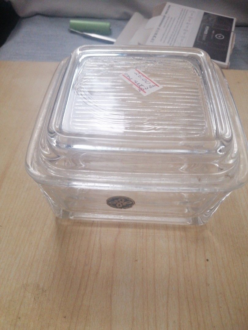 Clear Glass Square Container Lid (Category: Food Organization & Storage) located in Manila. Submitted by ceroma (Listing ID 1465008207, Image 1). Description: Clear glass lid with a modern square shape and ribbed pattern, 4 inches lenght, width, and 1.75 inches height, size designed for storage containers. Cjeck anuqhere of you will find as low as thos price,.