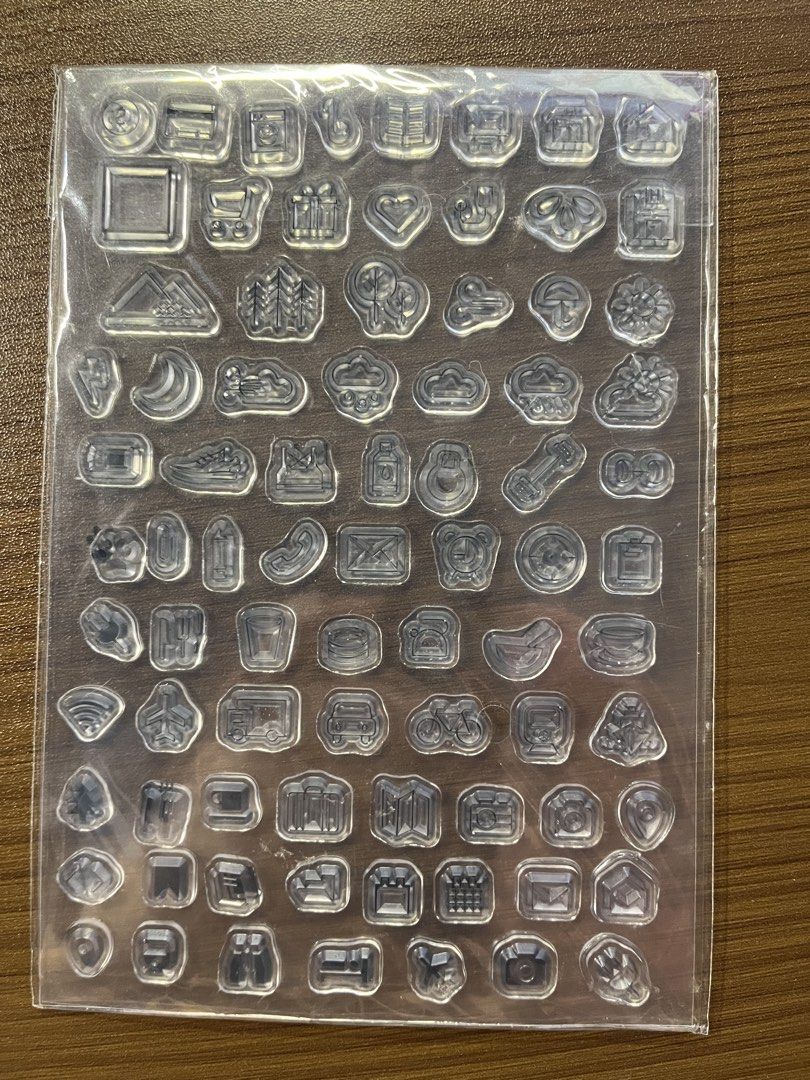 Clear stamp sheet icons (Category: Craft Supplies & Tools) located in Manila. Submitted by theinkwaddle (Listing ID 1465011992, Image 2). Description: - Features a huge variety of tiny icons including weather symbols, transportation, fitness gear, and planner markers - Perfect for bullet journals, planners, and DIY craft projects - Easy to peel off and use with any standard acrylic block.