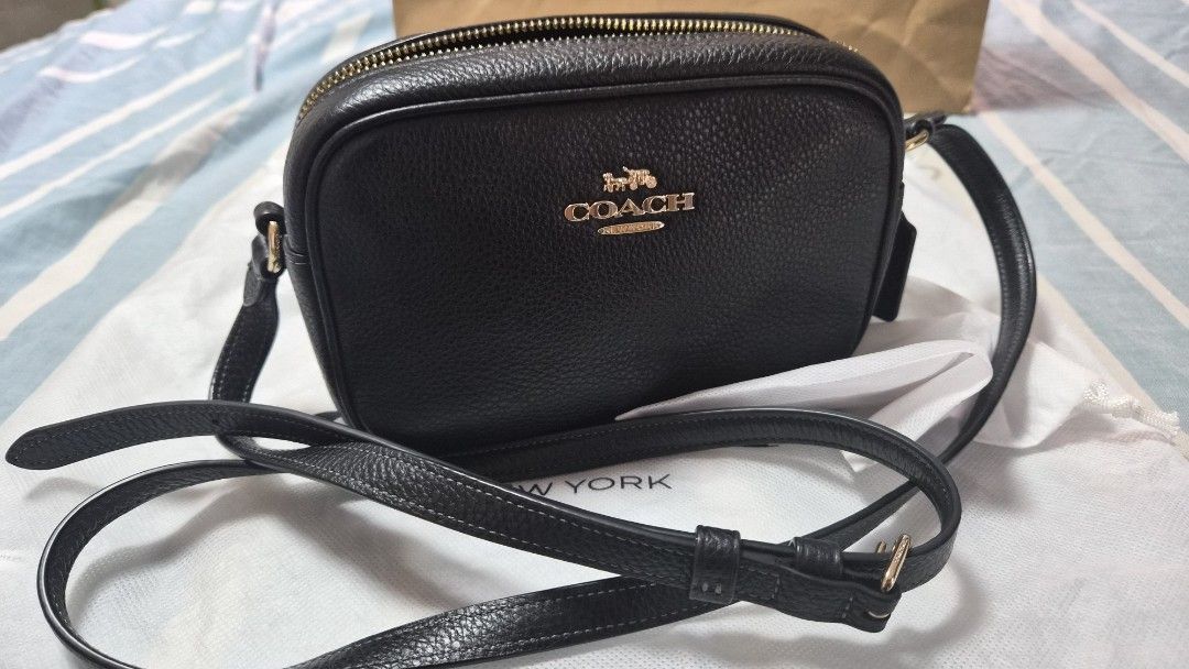 Coach Black Pebbled Leather Camera Bag and Multifunction Card Case (Category: Cross-body Bags) located in Rizal. Submitted by kpolipinedz (Listing ID 1464977642, Image 2). Description: - Authentic Coach black pebbled leather camera bag - Includes matching multifunction card case - Bought from Coach store in Taiwan last December 2025 - Comes complete with original Coach paper bag, dust bags, cards and receipt.