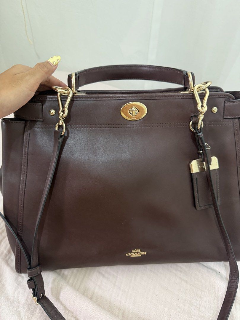 Coach Dark choco Brown satchel bag (Category: Luxury Bags & Wallets) located in Consolacion. Submitted by mrshoarderrr (Listing ID 1465078788, Image 2). Description: Rank A check all photos for sign of used.