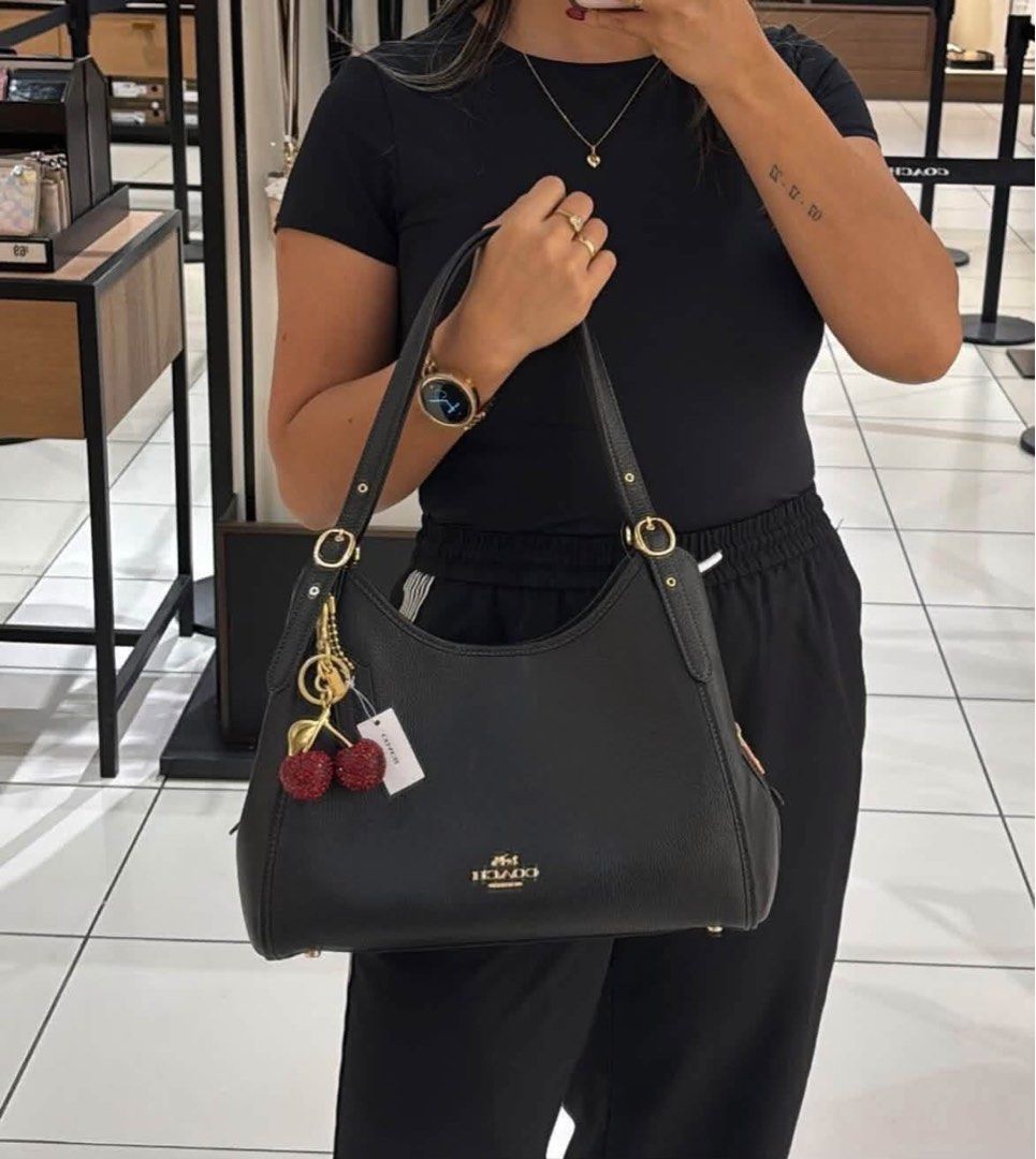 Coach Erin Shoulder Bag in Black (Category: Shoulder Bags) located in Manila. Submitted by msddirectfactoryoutlet (Listing ID 1464987777, Image 1). Description: .