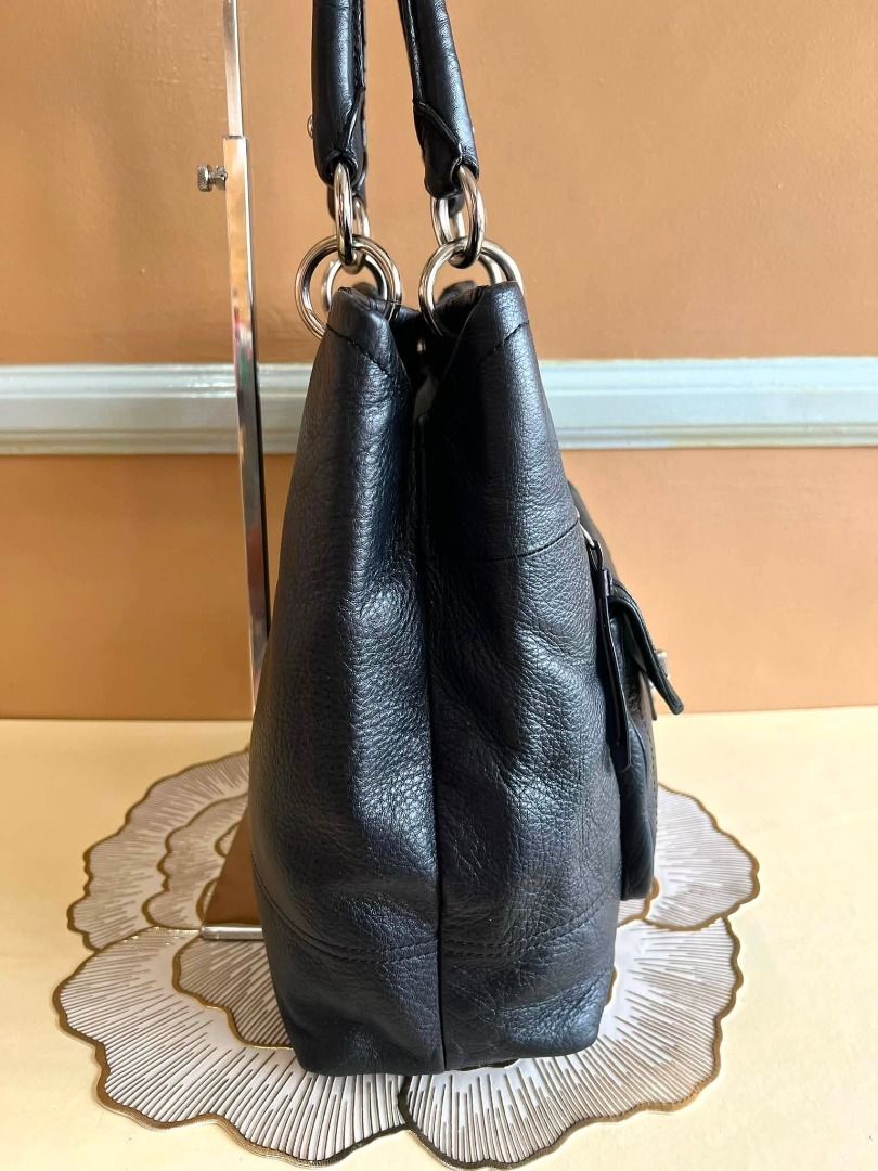 Coach Hamptons Turnlock Leather Carryall Bag (Category: Tote Bags) located in Quezon City. Submitted by bellafashion08 (Listing ID 1465110094, Image 2). Description: Dimension: - Height = 12 in. - Length = 12 in. * From U.S * Nice in actual .