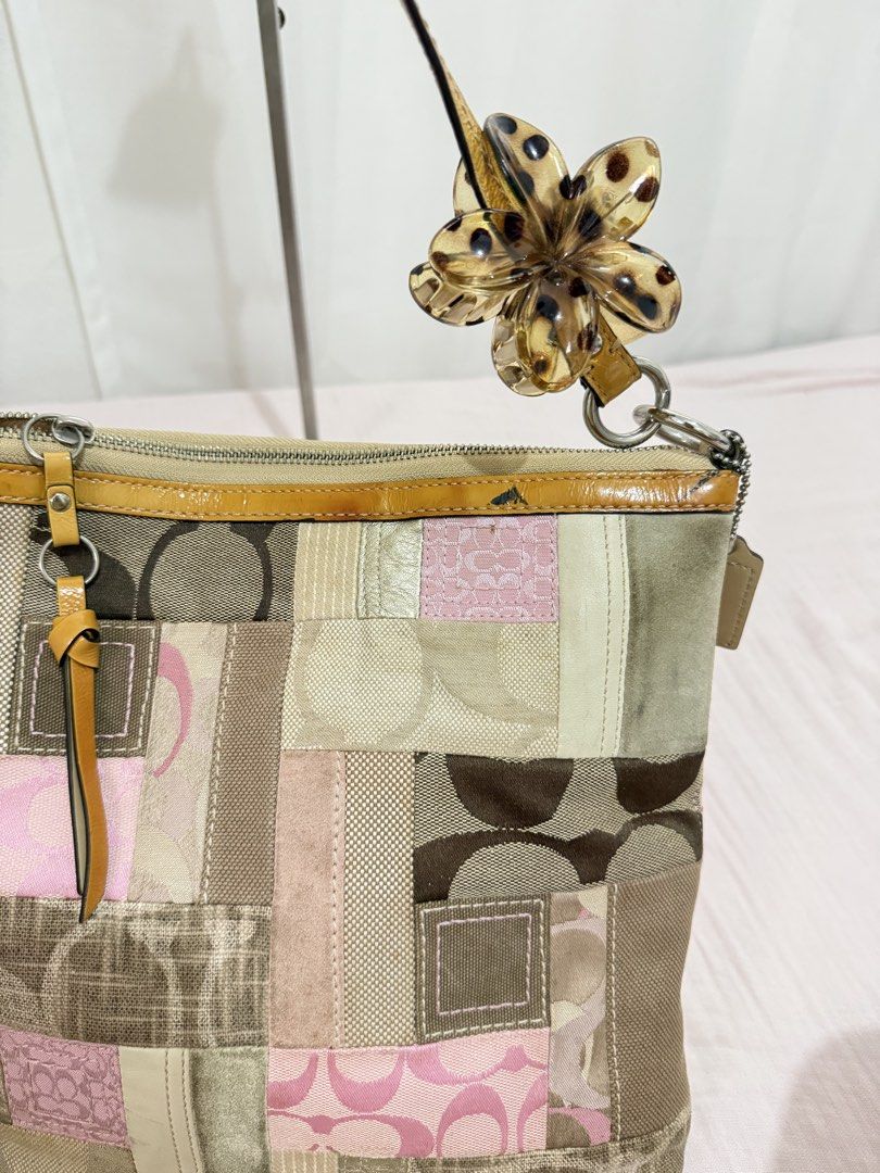Coach Patchwork Shoulder Bag with Tortoiseshell Flower Charm (Category: Luxury Bags & Wallets) located in Consolacion. Submitted by mrshoarderrr (Listing ID 1465080702, Image 2). Description: Rank Ab minimal stain.