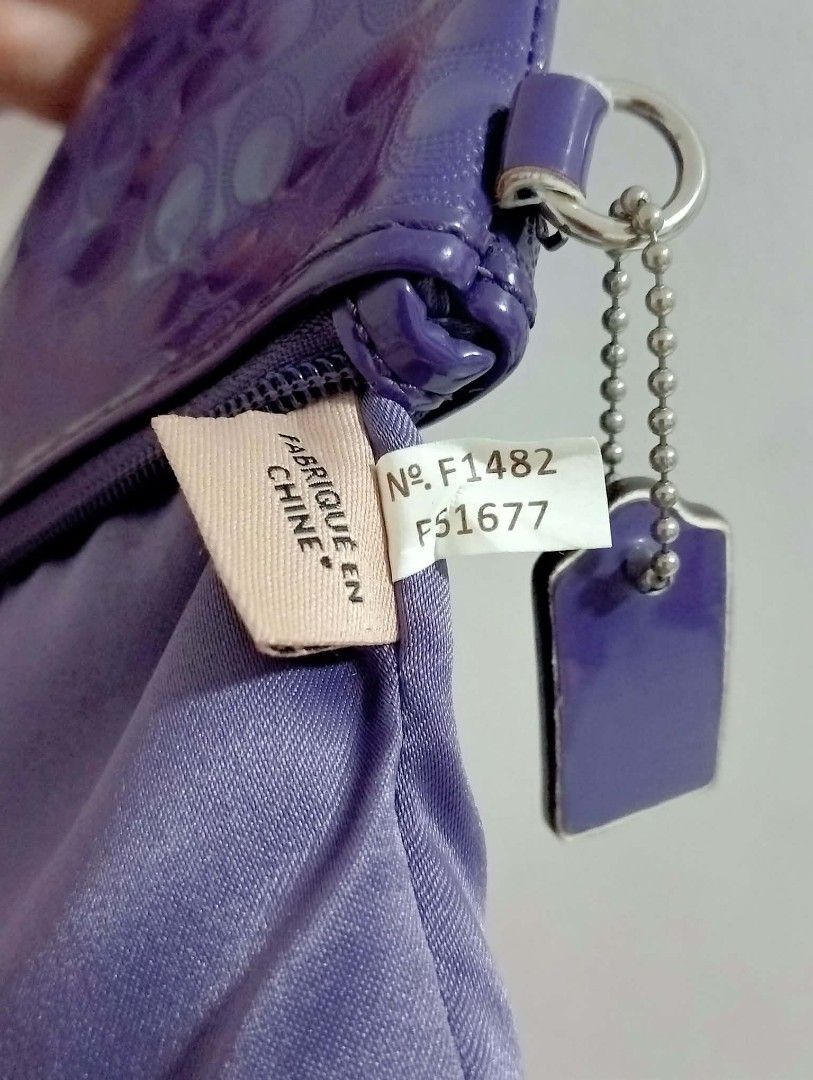 Coach Purple Wristlet (Category: Luxury Bags & Wallets) located in Siniloan. Submitted by treyyasonlineshop (Listing ID 1465077494, Image 3). Description: approx 8" missing leather strap.