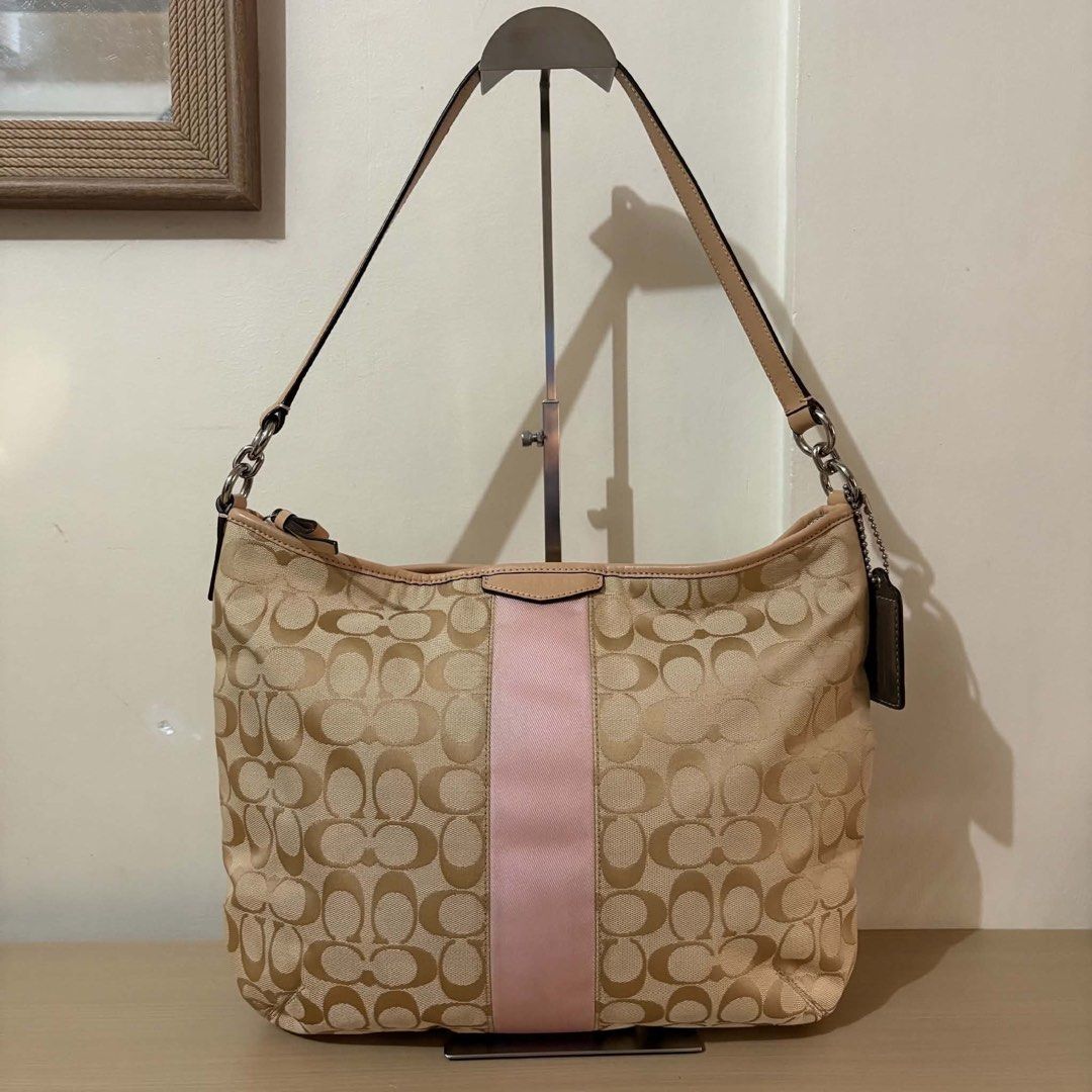 Coach Signature Stripe Hobo Bag (Category: Shoulder Bags) located in Cavite. Submitted by chubbsavenue (Listing ID 1465012909, Image 1). Description: .