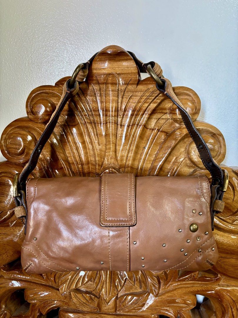Coach soho for sale as pack (Category: Shoulder Bags) located in Naga. Submitted by closet_redux (Listing ID 1464973333, Image 3). Description: Vintage Coach Soho Swarovski Studded Demi Shoulder Bag Rare design with studs and rhinestones Hello po! Selling my preloved bags. RFS: Decluttering original Details and conditions are included in the individual pics Normal signs of wear on hardware and leather. • A gentle reminder: this is preloved, so ki