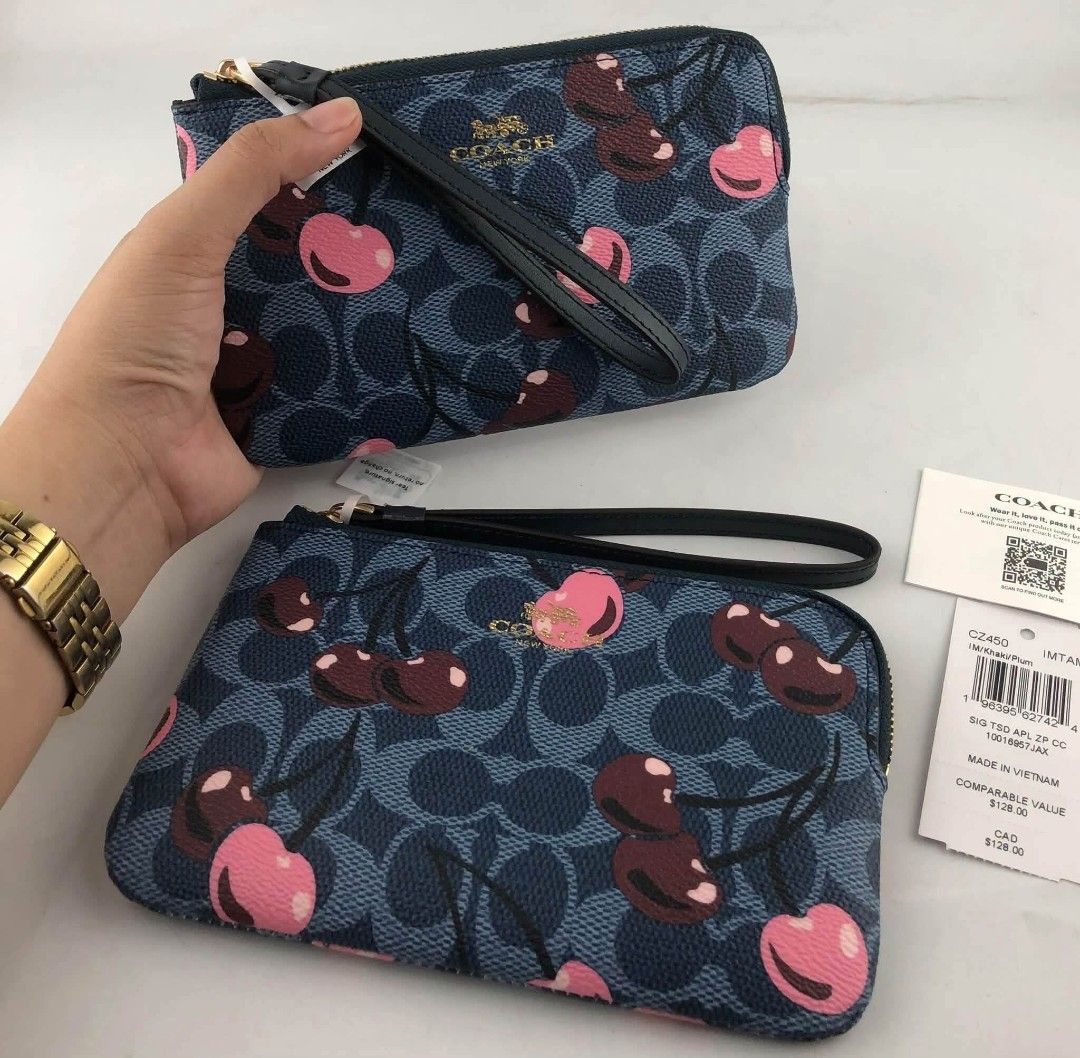 Coach Wrislet Signature with Cherry Print (Category: Wallets & Card holders) located in Quezon City. Submitted by bagsboutiqueph (Listing ID 1465167709, Image 2). Description: LAST PRICE POSTED. LIMITED STOCKS! BRANDNEW WITH INCLUSIONS. COLOR MAY SLIGHTLY VARY IN ACTUAL DUE TO LIGHTING AND CAMERA SETTING. OTHER PHOTOS WILL BE SEND DURING PURCHASE AND FOR SURE BUYERS ONLY. WHEN IN DOUBT, DO NOT ORDER. THANK YOU..