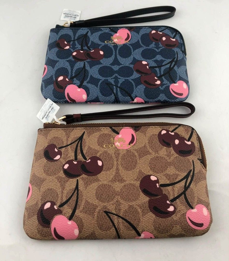 Coach Wrislet Signature with Cherry Print (Category: Wallets & Card holders) located in Quezon City. Submitted by bagsboutiqueph (Listing ID 1465167709, Image 1). Description: LAST PRICE POSTED. LIMITED STOCKS! BRANDNEW WITH INCLUSIONS. COLOR MAY SLIGHTLY VARY IN ACTUAL DUE TO LIGHTING AND CAMERA SETTING. OTHER PHOTOS WILL BE SEND DURING PURCHASE AND FOR SURE BUYERS ONLY. WHEN IN DOUBT, DO NOT ORDER. THANK YOU..